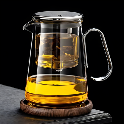 Clear glass teapot with wooden base