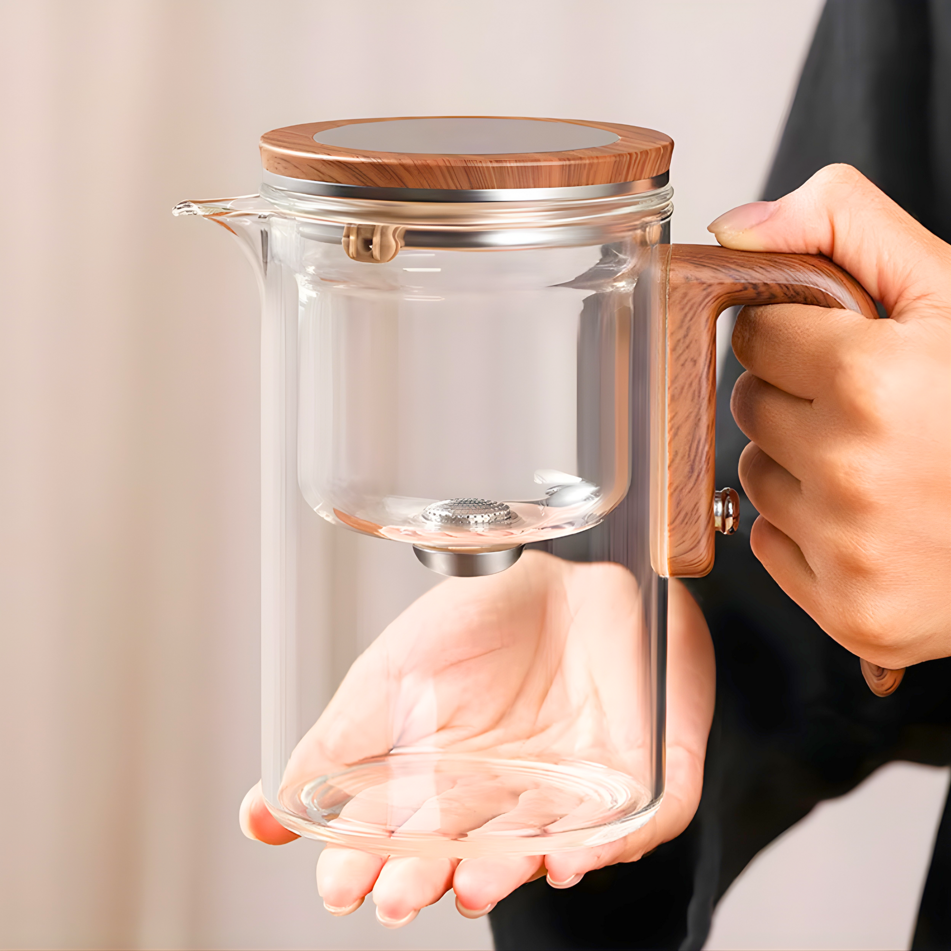 Clear glass teapot with wooden handle