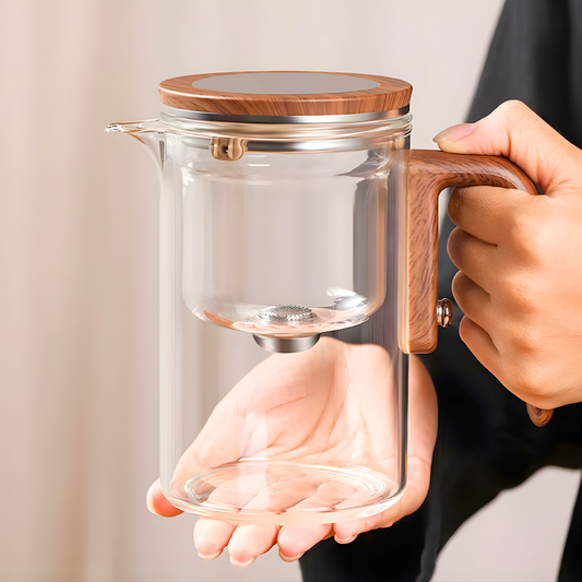 Clear glass teapot with wooden handle